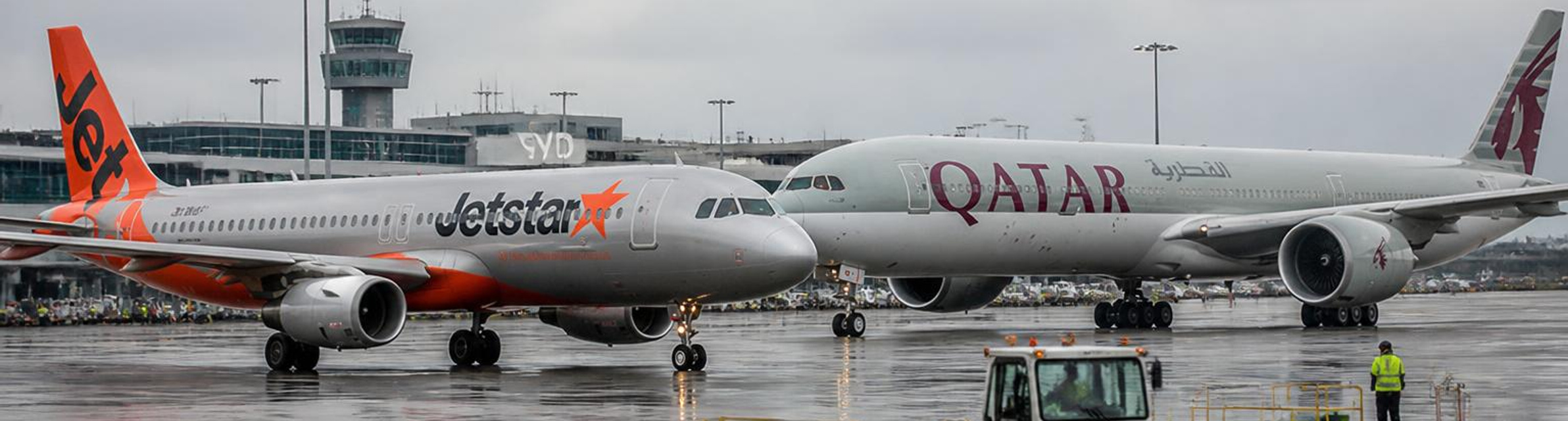 Near-collision between Jetstar and Qatar Airways planes at Sydney airport prompts safety investigation amid staffing concerns